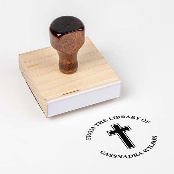 Wood handle stamp body with book stamp impression