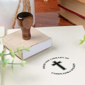 Custom book stamp on paper with wood handle stamp body