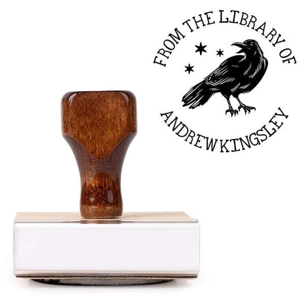 Front view of wood handle stamp body with library book stamp impression