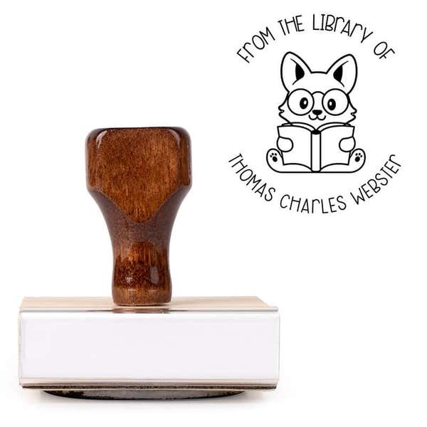 Front view of wood handle stamp body with library book stamp impression