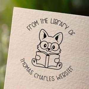 Personalized book stamp impression on white paper
