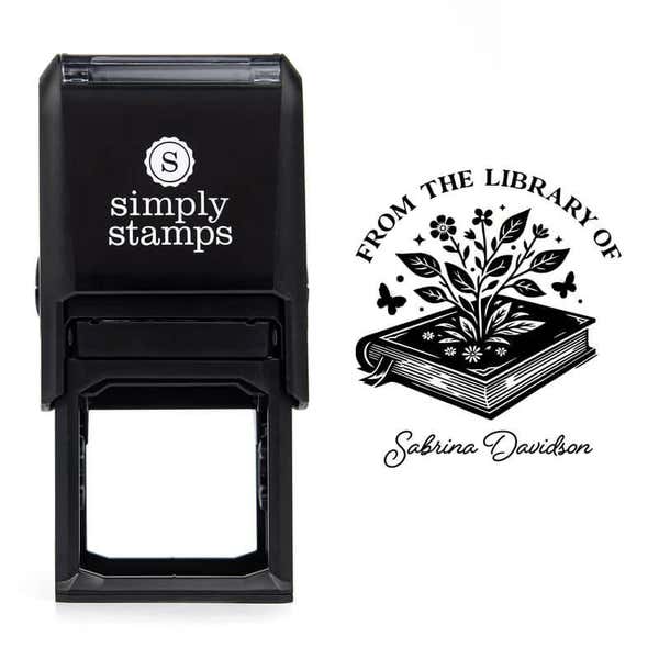Front view of self-inking stamp body with library book stamp impression example