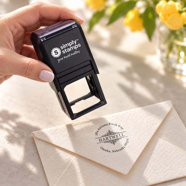 Hand holding the Ramsey Vintage Deco Address Stamp