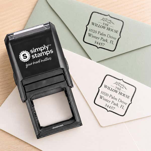 Quote Square Logo Address Stamp resting beside a freshly stamped custom logo impression
