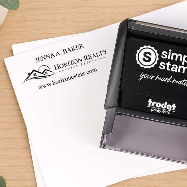 Custom Text Above and Below Rectangle Logo Stamp shown in a workspace beside a freshly stamped logo impression
