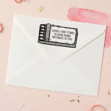 Sardine Tin return address stamp by Salt & Paper on a pink envelope