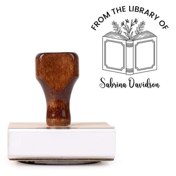 Front view of wood handle stamp body with library book stamp impression