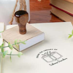 Custom book stamp on paper with wood handle stamp body