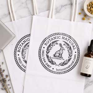 Rope Border Custom Extra Large Logo Stamp resting beside a freshly stamped custom logo impression
