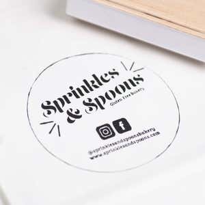 3 inch Custom Logo Stamp in use, with a stamped logo impression on packaging