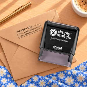 Envelopes stamped with the Urban Custom Address Stamp, flat lay