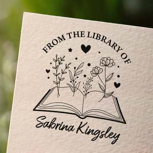 Personalized book stamp impression on white paper