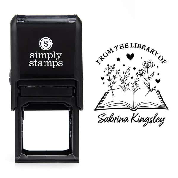 Front view of self-inking stamp body with library book stamp impression example