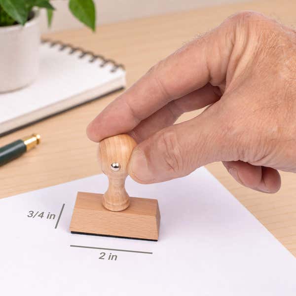 Diagram showing the impression area dimensions of the Rectangle Logo Wooden Hand Stamp