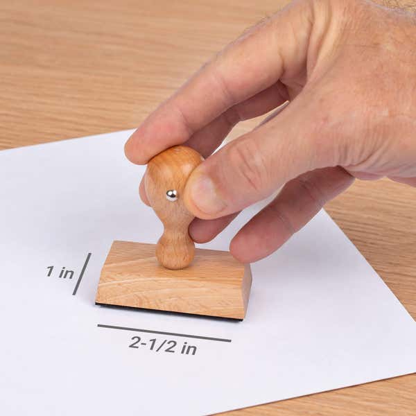 Diagram showing the impression area dimensions of the Custom 2 Line Rectangle Logo Hand Stamp