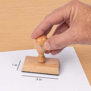 Diagram showing the impression area dimensions of the Custom Medium Rectangle Logo Hand Stamp