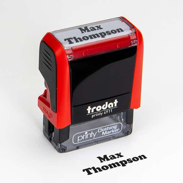 Angled View of Classic 2 Line Name Stamp Impression on White Background with 4911 Stamp Body