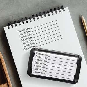 Example of the 7 Line Form Custom Rubber Stamp impression in a notebook