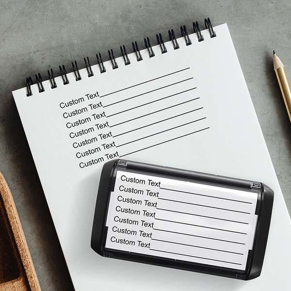 Example of the 7 Line Form Custom Rubber Stamp impression in a notebook