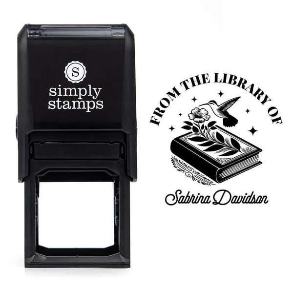 Front view of self-inking stamp body with library book stamp impression example