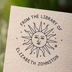 Personalized book stamp impression on white paper