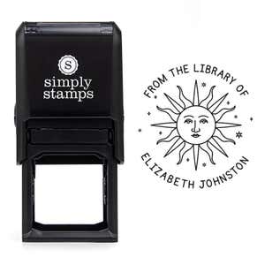 Front view of self-inking stamp body with library book stamp impression example