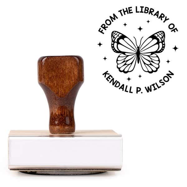 Front view of wood handle stamp body with library book stamp impression