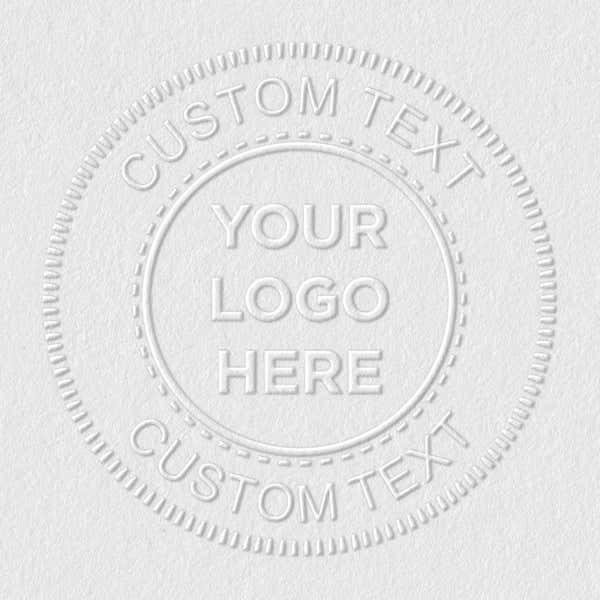 Close-up of the stamped logo impression on paper