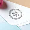 Joy Peace Love Round Address Stamp impression close up on envelope
