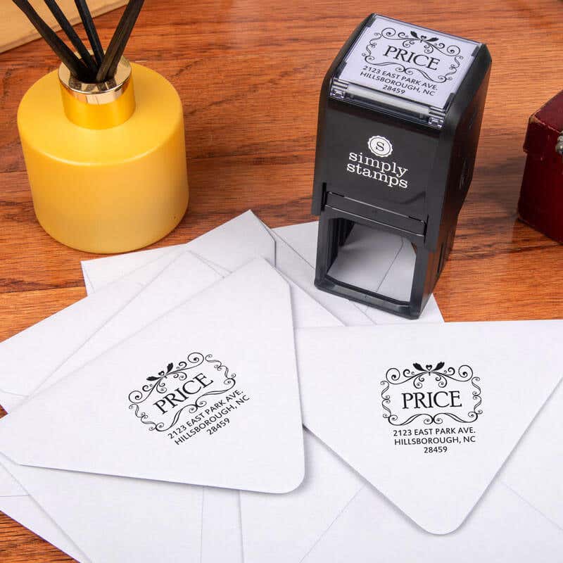 Price Curves Square Address Stamp design impression on two envelopes next to self inking stamp body