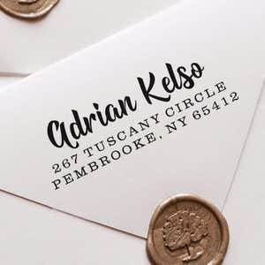Bold Edgy Script Custom Return Address Stamp impression close up on white envelope