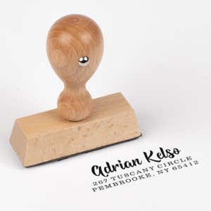 Bold Edgy Script Custom Return Address Stamp impression next to european stamp body
