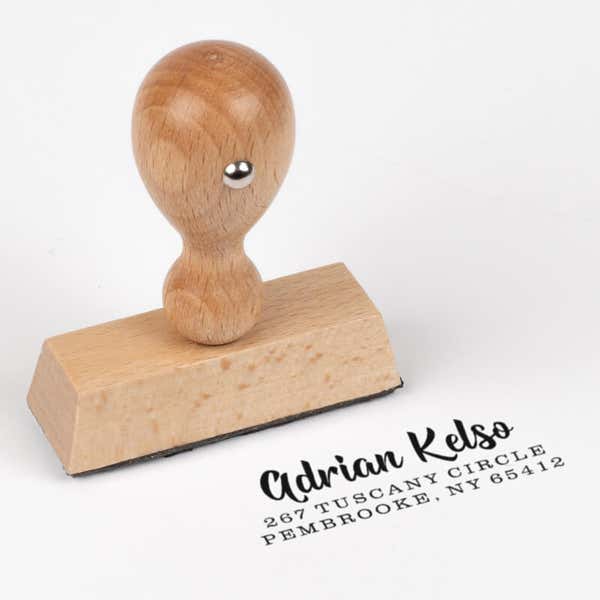 Bold Edgy Script Custom Return Address Stamp impression next to european stamp body