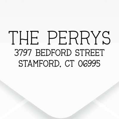 The impression made from the Dupont Brush Return Address Stamp on grey paper