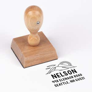 Mountain Custom Return Address Stamp impression next to european stamp body