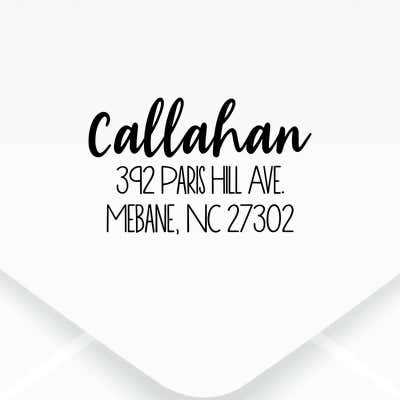 Fully Customizable Script Name Return Address Stamp design, close up on an envelope
