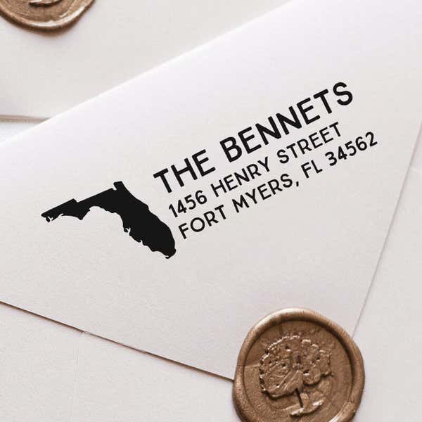 Select Your State Custom Return Address Stamp impression close up on white envelope