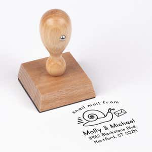 Snail Mail Custom Return Address Stamp impression next to european stamp body