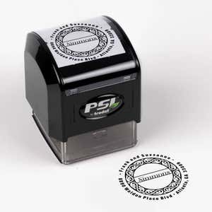 Simmons Return Address Stamp impression next to pre inked stamp body