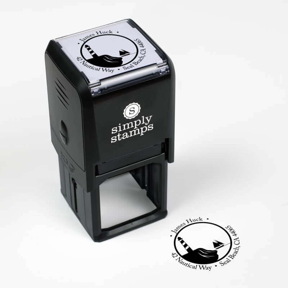 Nautical Lighthouse with Ship Round Address Stamp impression next to self inking stamp body