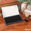 Opened Medium Ink Pad with Hand Stamp