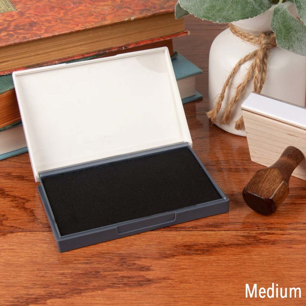 Opened Medium Ink Pad with Hand Stamp