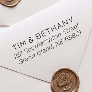 Light Sans Serif Address Stamp on envelope close up shot
