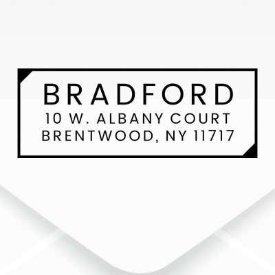 The impression made from the Dupont Brush Return Address Stamp on grey paper