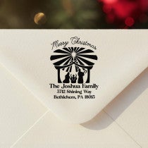 Personalized ‘Nativity Scene’ address stamp impression on envelope flap for holiday cards.