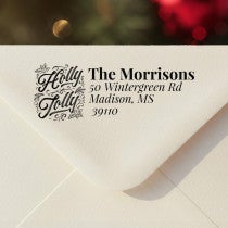 Personalized ‘Holly Jolly Script’ address stamp impression on envelope flap for holiday cards.