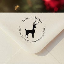 Personalized ‘Stag Reindeer’ address stamp impression on envelope flap for holiday cards.