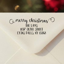 Personalized ‘Merry Christmas Decorative Swirl’ address stamp impression on envelope flap for holiday cards.