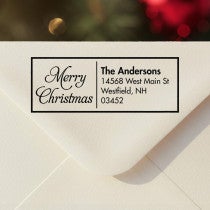 Personalized ‘Merry Christmas Scripted’ address stamp impression on envelope flap for holiday cards.