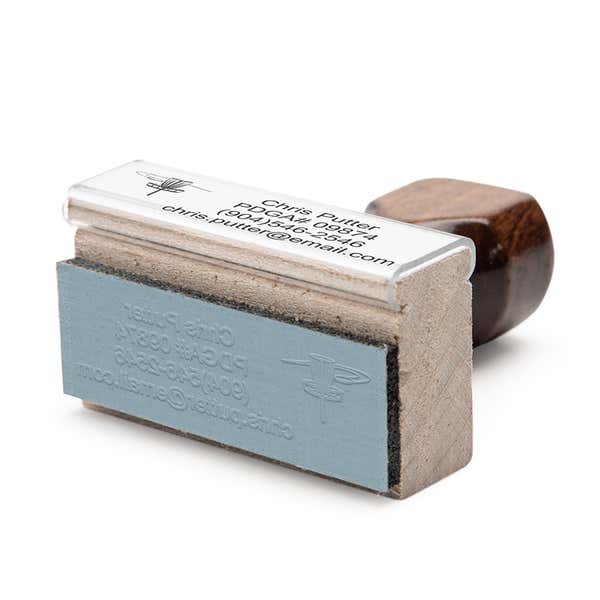 The traditional wood handle stamp that shows with the Disc Golf Custom Stamp